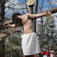 <p>Father Vincent Druding (Jesus) and members of the Assumption Catholic Church congregation carried out a live reenactment of the crucifixion of Jesus on Good Friday,</p>