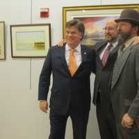 <p>Ossining Bicentennial Committee Chairman George Camp, Mayor William Hanauer and Ossining Historical Society President John Wunderlich celebrate the village&#x27;s Bicentennial Celebration Tuesday night. </p>