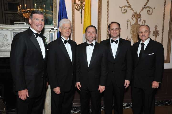 Patrick Dunican Jr., left, and Mario Gabelli, second from left, were honored at Friday&#x27;s dinner. They are shown with Westchester County Executive Rob Astorino; Iona College President Dr. Joseph Nyre and New York police commissioner Raymond Kelly.