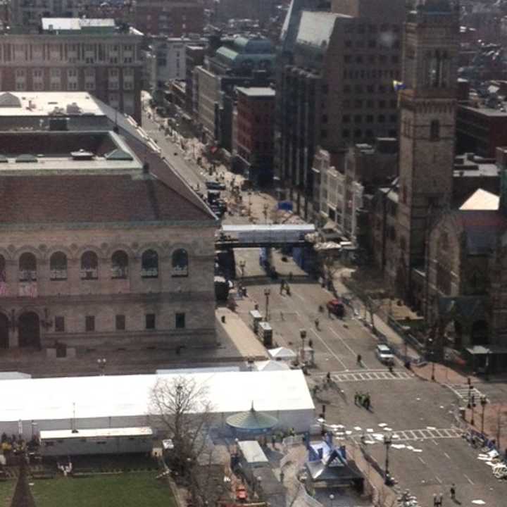 A view of the Boston Marathon finish line from an 17th floor office about a block away. 
