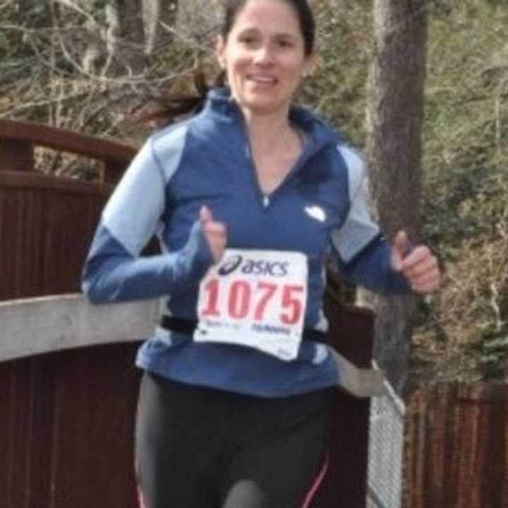 Briarcliff runner Benedicte Uguen, seen here at a prep race in Connecticut, finished the Boston Marathon about 45 minutes before two explosions ended the race. 