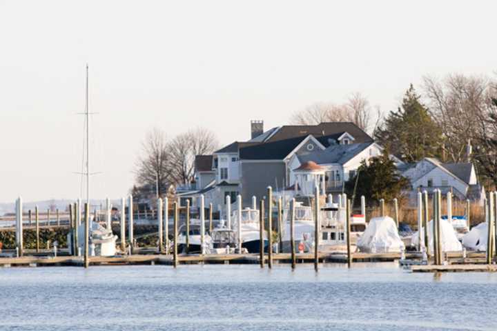 Boaters in Norwalk Harbor were rescued after their boats overturned.