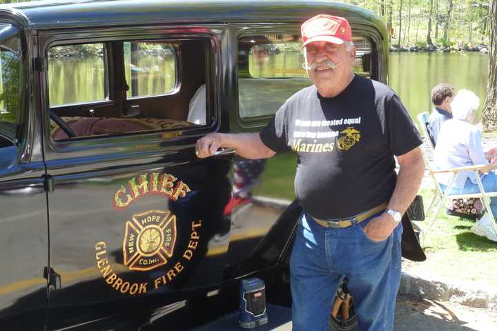 Stamford&#x27;s Pasqualie Battinelli stands by his 1935 Buick Sedan at the Model Ts to Mustangs car show Satuday at the Stamford Museum and Nature Center.