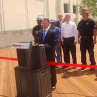 <p>County Executive Rob Astorino, along with members of Titan Construction and other county officials, celebrate the opening of the boardwalk at Rye Playland.</p>