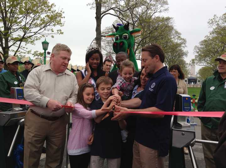 County Executive Rob Astorino and county legislator Bill Ryan (left) help cut the ribbon on Rye Playland Saturday. 