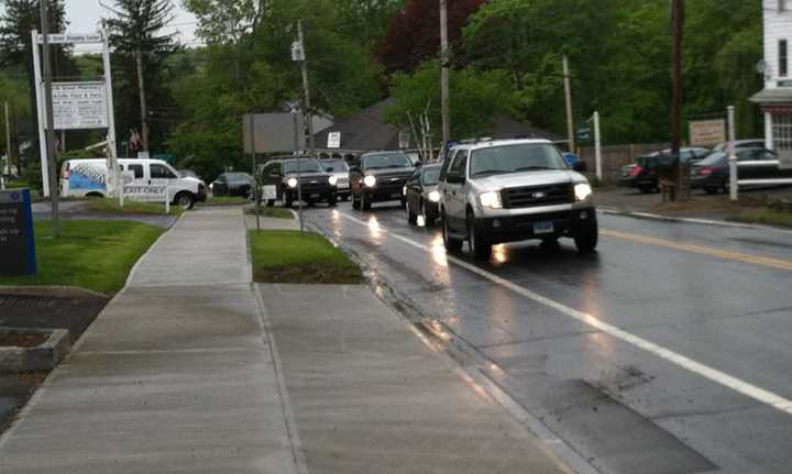 Prince Harry&#x27;s motorcade pulls into Greenwich on North Street just before 11:30 a.m. Wednesday on its way to the Polo Club. 