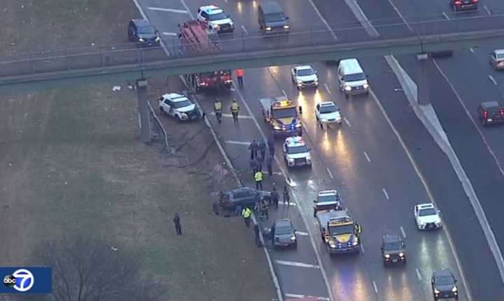 The damaged NJSP vehicles can be seen on Route 80 in Paterson near upper left (below the overpass) and directly behind the tow truck near lower right.