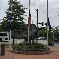 <p>The flags are half-staff at the Norwalk Police Department.</p>