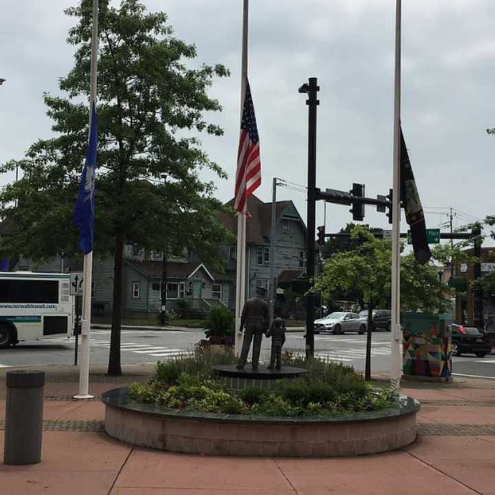 The flags are half-staff at the Norwalk Police Department.