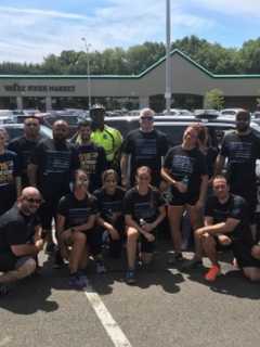 Norwalk's Finest Carry The Torch For Special Olympics