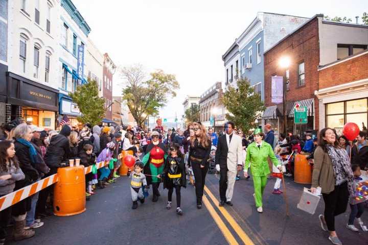 The Bat Family and supervillains Two Face and The Riddler at the Nyack Halloween Parade.