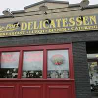 <p>The Se-Port Deli offers a large list of thick sandwiches that draws a line of customers every day.</p>