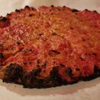 <p>One of the restaurant&#x27;s famed &#x27;charred&#x27; pies.</p>