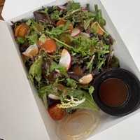 <p>Pork belly with mixed greens.</p>