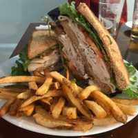 <p>Turkey club with fries.</p>