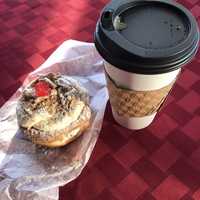 <p>Cannoli donut and coffee from Glaze Donuts in New Milford.</p>