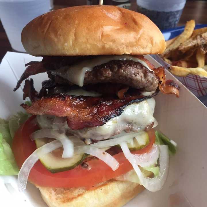 Double Dutch Burger with two 1/4 lb. beef patties, cheddar, bacon, special sauce, lettuce, tomato and onion from Meyer&#x27;s Olde Dutch Food &amp; Such (184 Main Street in Beacon).