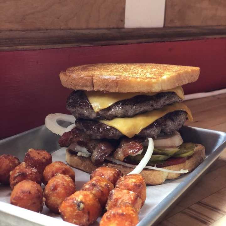 Double cheeseburger with bacon, onions, tomatoes and pickles from BSF - Burgers Shakes &amp; Fries (302 Delavan Avenue in Greenwich)