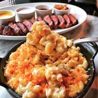 <p>Mac and cheese with steak.</p>