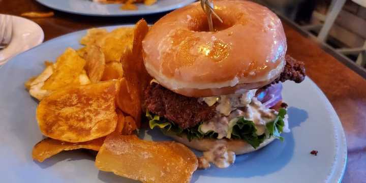 Chicken sandwich on a donut.