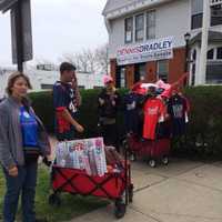 <p>Vendors sell Trump merchandise Saturday near the Klein Memorial Auditorium in Bridgeport before the rally for the presidential hopeful.</p>