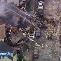 <p>Neighbors of the Goshen Street building were evacuated as firefighters put down flames after the 9:25 a.m. blast.</p>