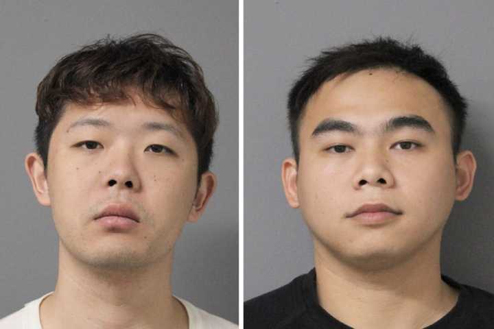 Yisheng Zhang and Bai Lun Wu, both aged 29, were nabbed for conducting a scam that cost a Long Island woman over $30,000, police reported.