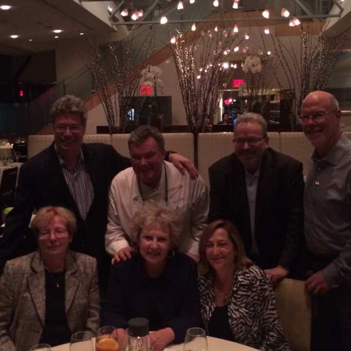 Chef Peter X. Kelly, second from left, top row, and some of the folks behind Table to Table.