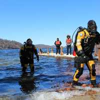 <p>Brookfield police divers take a practice plunge into Candlewood Lake.</p>