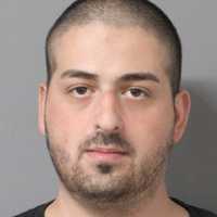 Long Island Man Charged With Burglary For Threatening Former Co-Workers, Police Say