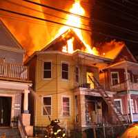 <p>The fire destroyed one Jackson Street home in Passaic and damaged another.</p>