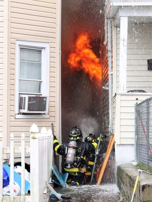 17 People, Three Dogs, Cat Flee Three-Home Passaic Fire