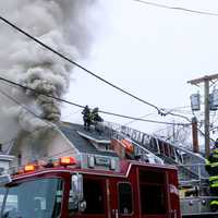 <p>Firefighters had to go to an exterior attack after a partial ceiling collapse early on.</p>