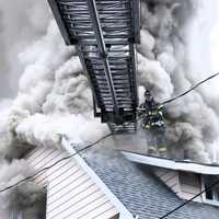 <p>At the scene of the fire on Van Buren Street in Passaic on Tuesday, Dec. 26.</p>