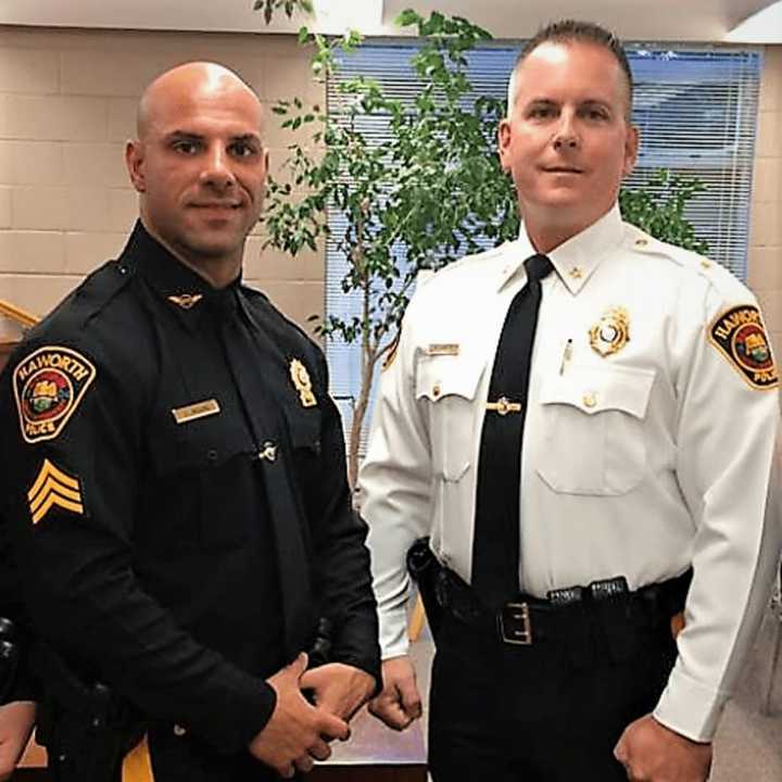 Sgt. Gianluca Ragone with Police Chief Michael Gracey.