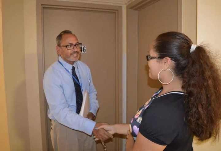 Tomas Ramirez introduces himself to an incoming Bassick High School freshman before the start of the 2016-17 school year. Ramirez will be stepping down at the end of the year, according to the Connecticut Post.