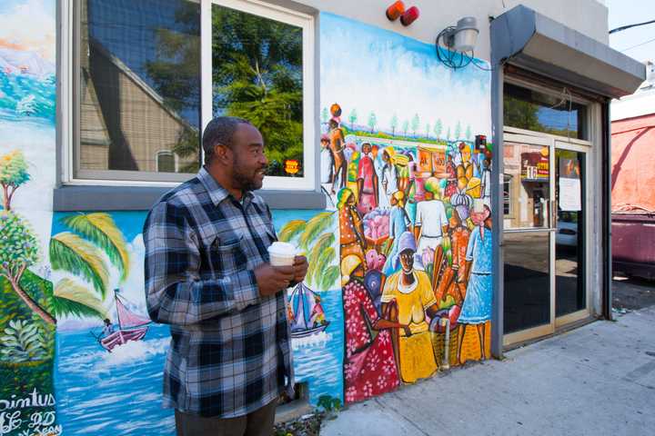 Renold Julien, Executive Director of Konbit Neg Lakay, Inc. outside Konbit Neg Lekay&#x27;s building in Spring Valley.