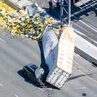 <p>The container landed on the hood of an SUV on the other side of Route 17 in Mahwah.</p>