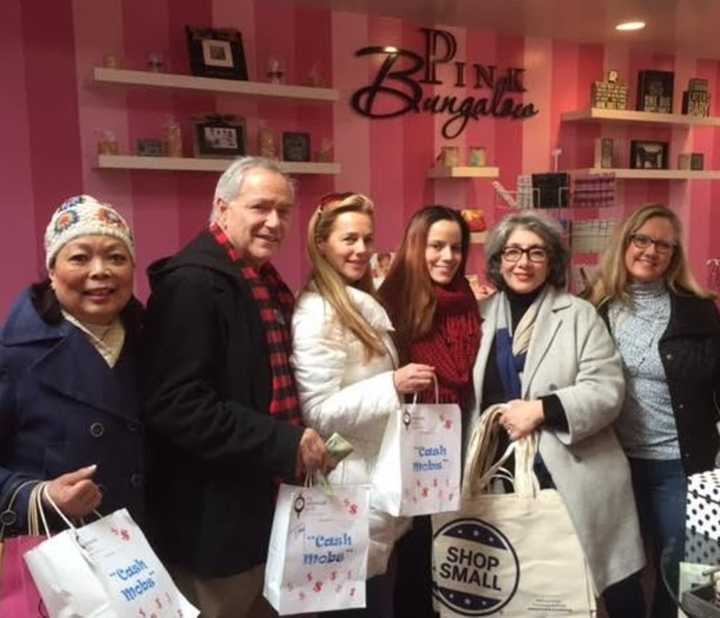 The Ridgewood Guild&#x27;s first &quot;cash mob&quot; at the Pink Bungalow, which sells gifts and accessories, cards, paper goods, and jewelry. It also does custom printing.