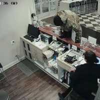 Watch: Knife-Wielding Robber At Long Island Motel Seen On Surveillance Video