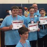 <p>Members of the Rogers Park Middle School team, made up of students from several Danbury schools, show off their certificates after qualifying to participate in the Odyssey of the Mind&#x27;s World Finals last month in Iowa.</p>