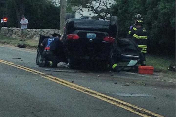 Car Rolls Over, Hits Pole On Newtown Avenue In Norwalk; Roadway Closed
