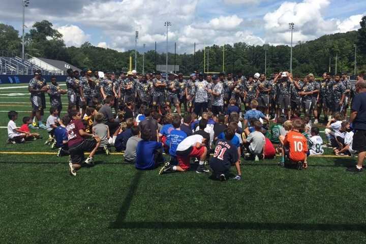 Area Players Put On The Pads For Charity At Pace Football Camp