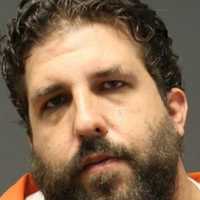 WILD RIDE: Hackensack Man With Arrest Record Goes For Officer's Gun In Ambo, Garfield PD Says