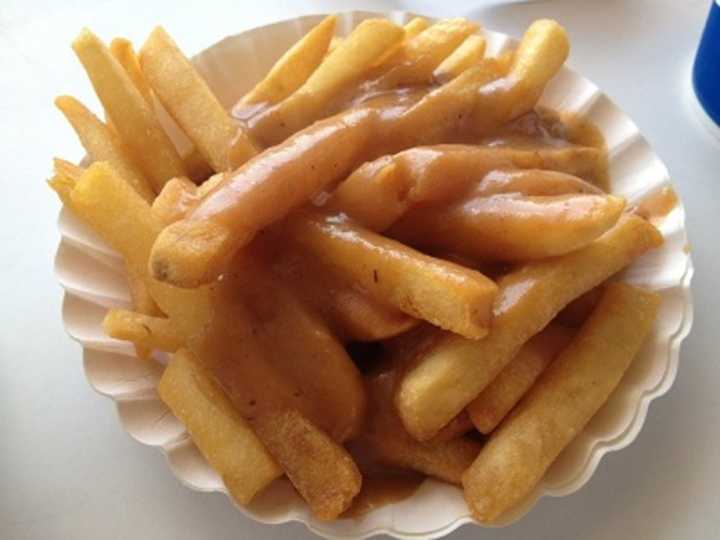 The gravy-soaked fries at Rutt&#x27;s Hut in Clifton go good with their famous &quot;rippers,&quot; hot dogs deep fried until their casings split and crack.