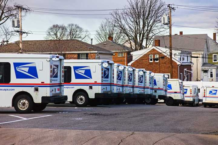 A 33-year-old Fitchburg woman who worked at the Gardner post office admitted to stealing more than $90,000 in cash from a business to pay off debts and send money to her family overseas, federal authorities said.