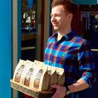 <p>No, John Traver hasn&#x27;t been reduced to hawking granola on the sidewalk, he&#x27;s still happily running the show at Samuel&#x27;s Sweet Shop in Rhinebeck.</p>