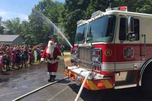 Santa Takes Sizzle Out Of Afternoon At Greenwich Camp