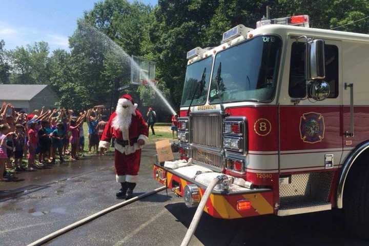 Santa Takes Sizzle Out Of Afternoon At Greenwich Camp