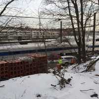 <p>A car was hit by a train at a private crossing in Norwalk on Tuesday. No injuries were reported.</p>